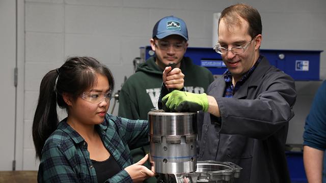 Student and instructor in auto education class