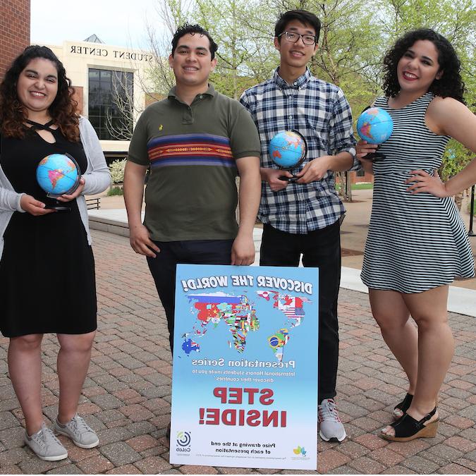 Honors Discover the World presenters, left to right: Angelica C., Melvin S., Lino C.T., and organizer Maria M.